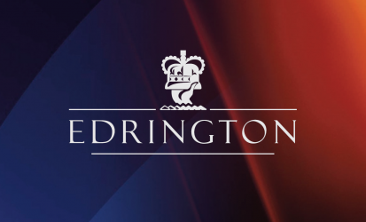 Edrington white logo with crown in middle of image on blue fading into deep red background