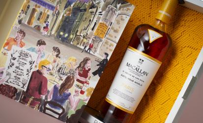 Close up of bottle shot of The Macallan Distil Your World Paris bottle with artwork of Paris on the left hand side of the pack 
