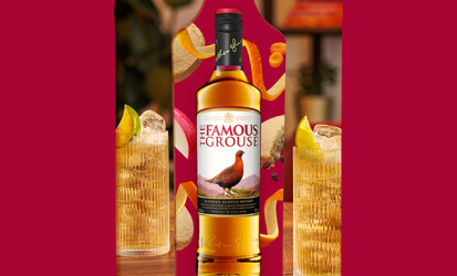 Bottle of The Famous Grouse Scotc Whisky, flanked by two glasses showing long drinks