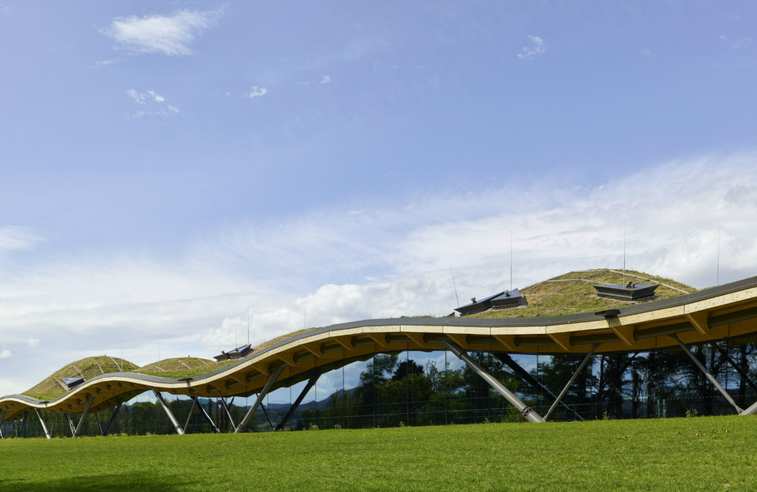 Landscape shot of exterior of Macallan Distillery on a bright sunny summer's day