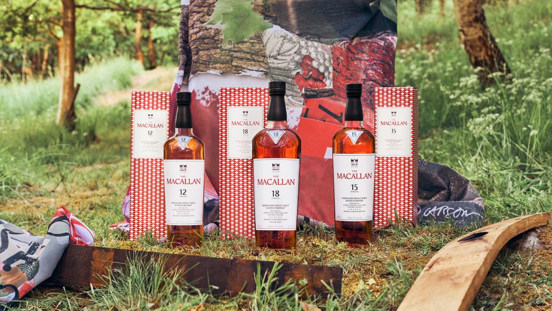Three bottles of The Macallan Double Cask 12, 15 and 18 Year Old in front of a wooded area