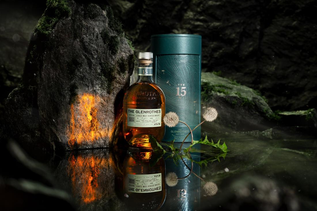 A bottle of The Glenrothes 15 and its canister