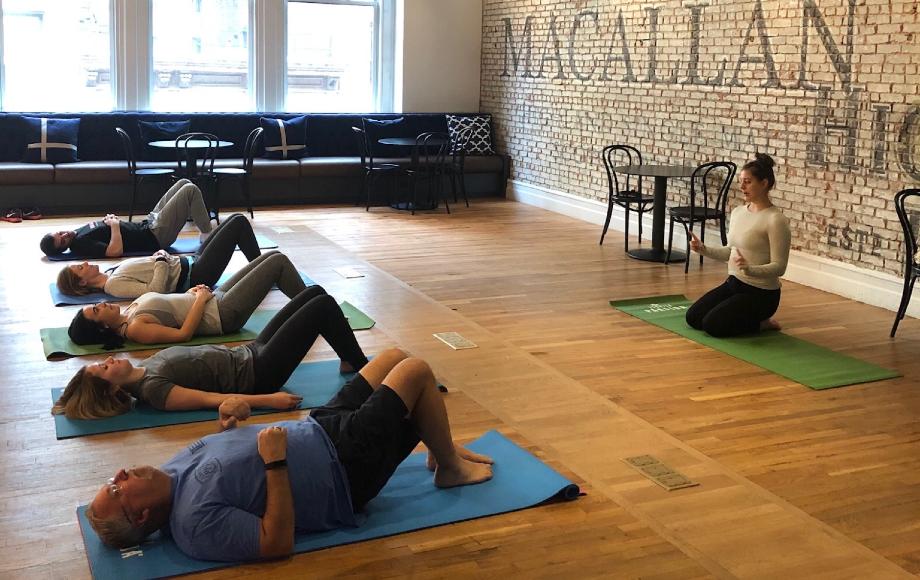 Colleagues in the NYC office participating in yoga
