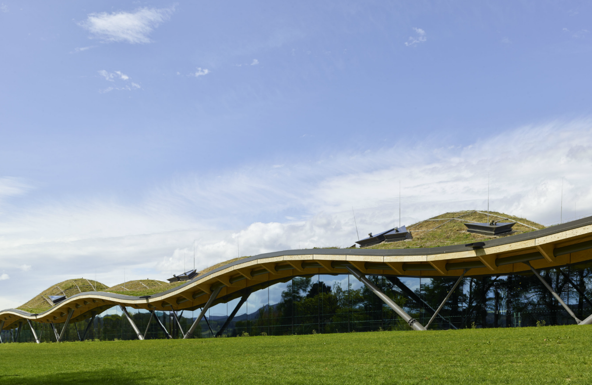 Landscape shot of exterior of Macallan Distillery on a bright sunny summer's day