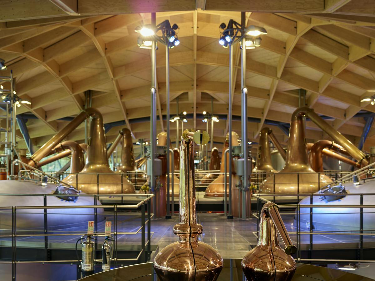 The Macallan distillery still house showing polished copper stills