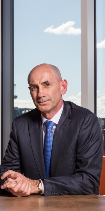 Ian Curle, former CEO of Edrington, sits at a boardroom table
